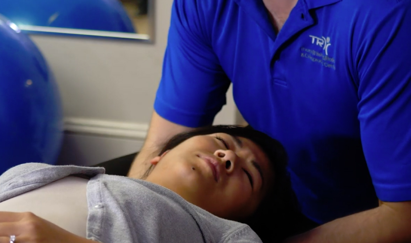 man receiving Chiropractor services nceck alignment at Richmondhill clinic