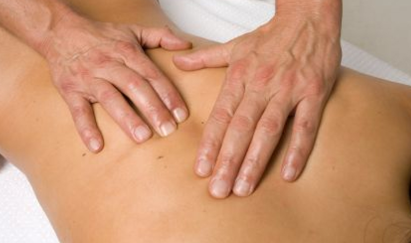 RMT services image of back massage at Thornhill total rehab